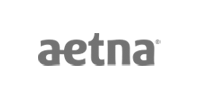 Aetna logo in gray text on a transparent background.